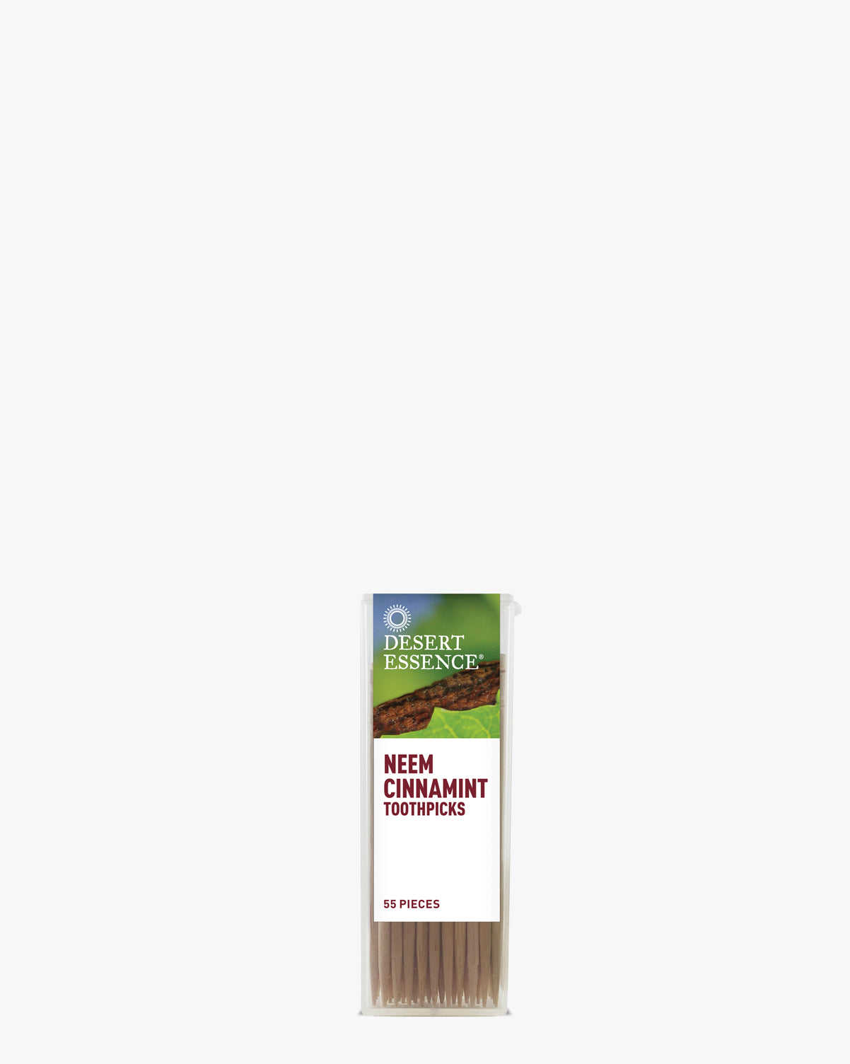 Cinnamint Neem Toothpicks by Desert Essence in slim white packaging displaying natural wooden toothpicks infused with neem, cinnamon, and wildmint oils, containing 55 pieces for sustainable dental care and fresh breath