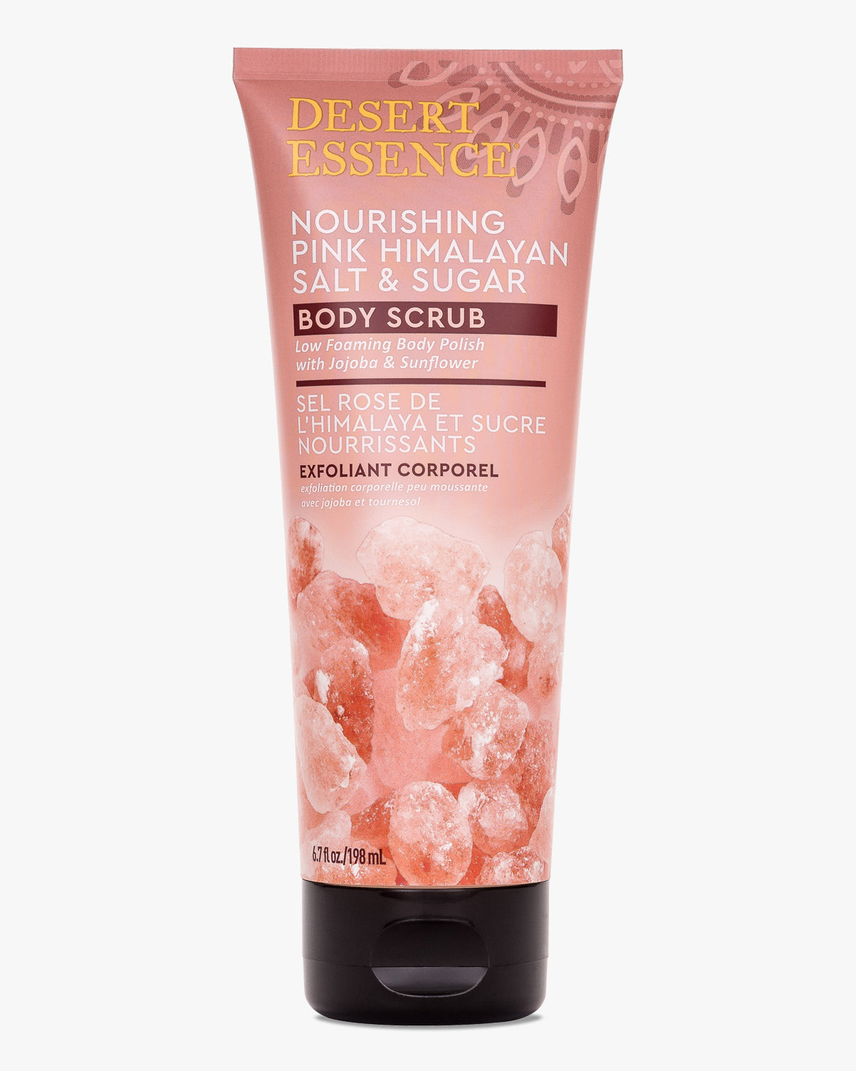 Nourishing Pink Himalayan Salt & Sugar Body Scrub in a pink squeeze tube with rose gold text, featuring crystalline salt graphics at bottom. Desert Essence brand product shown against white background.