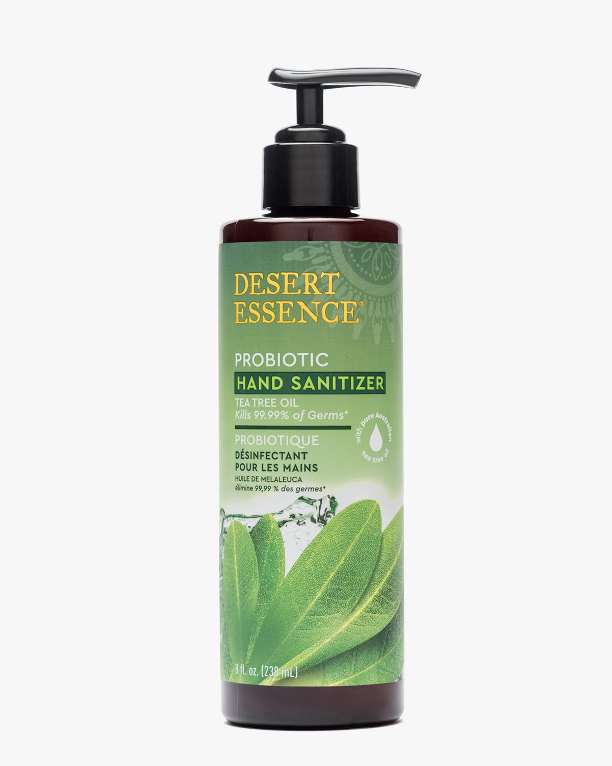 Desert Essence Tea Tree Oil Probiotic Hand Sanitizer in dark brown pump bottle with green label featuring tea tree leaf design, offering natural antimicrobial protection with probiotics and botanical extracts.