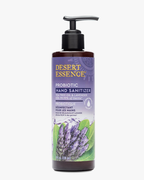 Desert Essence Lavender & Tea Tree Oil Probiotic Hand Sanitizer bottle with pump dispenser, featuring purple and green label design with lavender flower illustrations on white background. Contains 8 fl oz of probiotic-enriched sanitizing formula.
