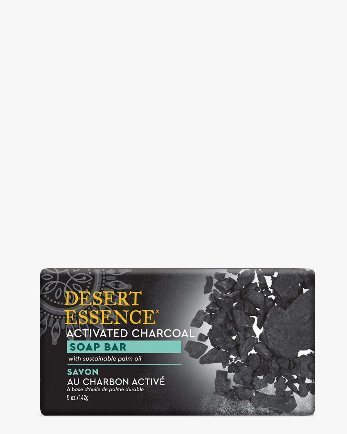 Activated Charcoal Soap Bar by Desert Essence with scattered black charcoal fragments on dark packaging, featuring teal accents and text highlighting sustainable palm oil ingredients