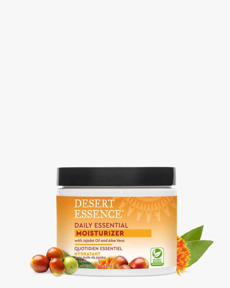 4 fl. oz. jar of the Desert Essence Daily Essential Moisturizer with berries.