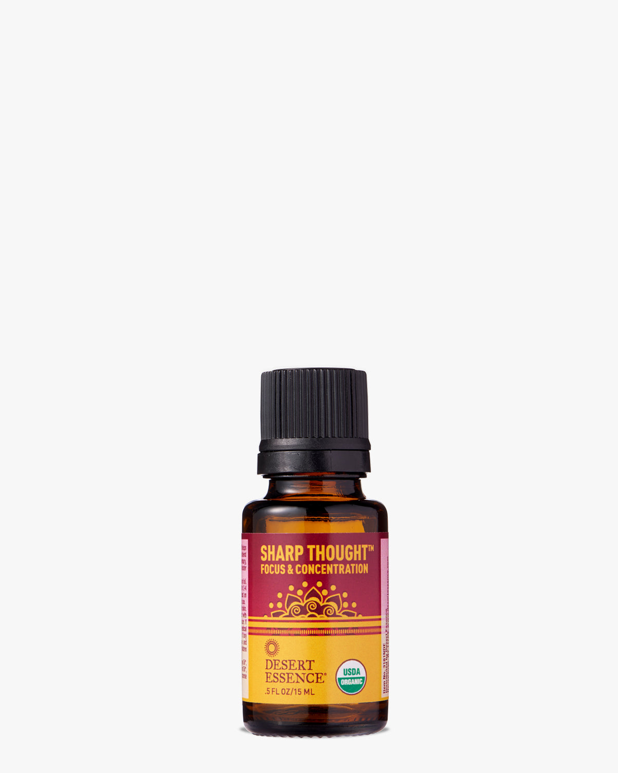 Sharp Thought Organic Essential Oil in amber glass bottle with black cap, featuring pink and orange label with ornate mandala design. Desert Essence brand aromatherapy blend for focus and concentration in a 0.5 fl oz size.