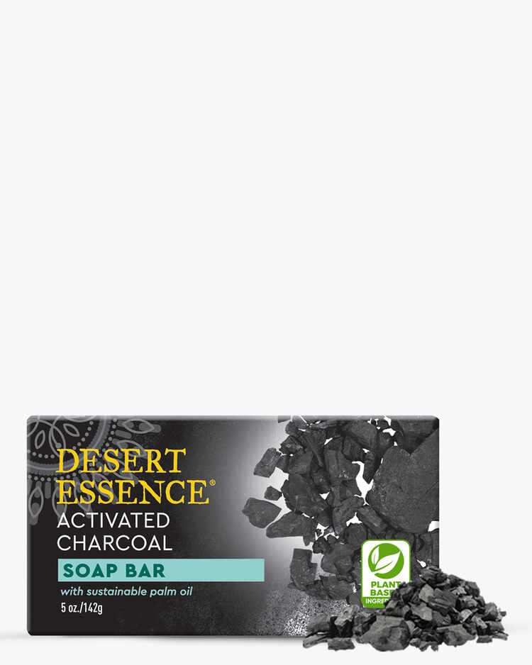 5 oz. of Desert Essence Activated Charcoal Soap Bar with pieces of charcoal.