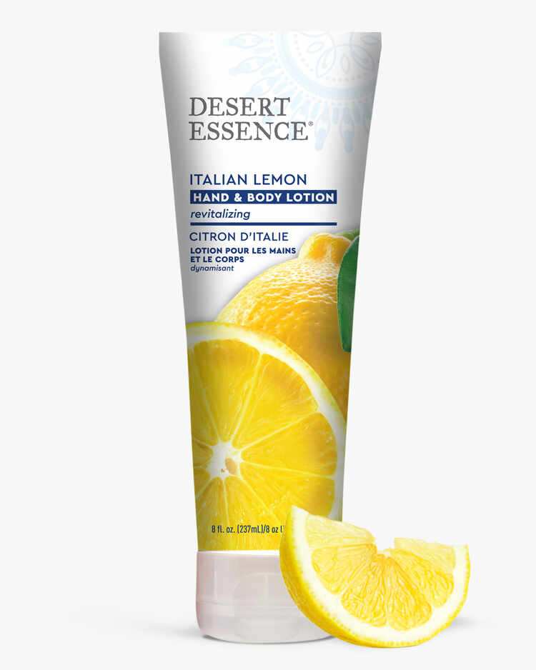 8 fl. oz. tube of the Italian Lemon Revitalizing Hand and Body Lotion with a lemon wedge by Desert Essence.