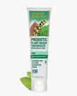 6.25 oz. tube of the Prebiotic Plant-Based Toothpaste Mint next to mint leaves by Desert Essence.