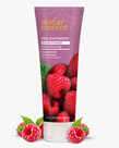 8 fl. oz. tube of the Red Raspberry Shine Enhancing Conditioner next to raspberries by Desert Essence.